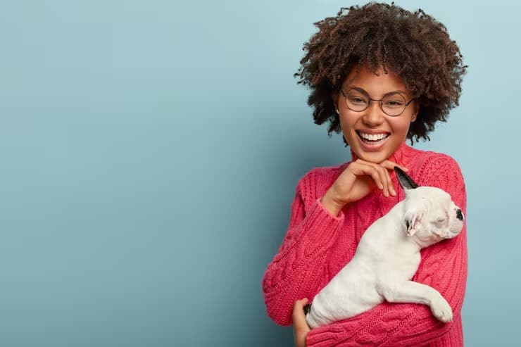 Happy pet owner at The Animal Doctor Vet Clinic